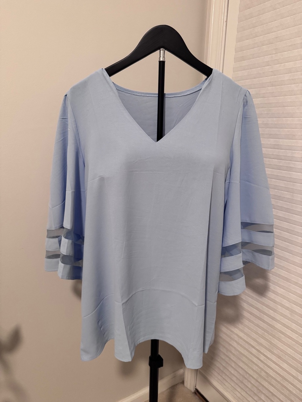 Light Blue V-Neck Women's Top with Ladder Sleeve Detail